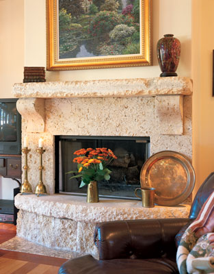 
This fireplace uses limestone from nearby Marble Falls, Texas, and ivory gold granite. Susan designed the fireplace, and a local craftsman created it.
